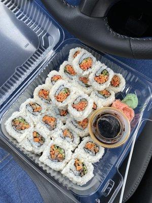 Spicy crab roll (2 orders, right side), salmon roll (left side)