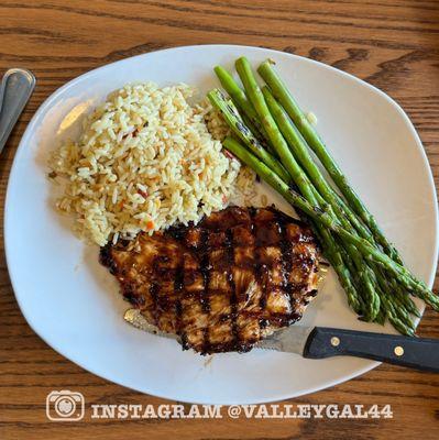 Balsamic chicken with sides of rice and asparagus