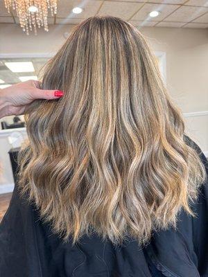 Beachy blonde highlights done by stylist Casey