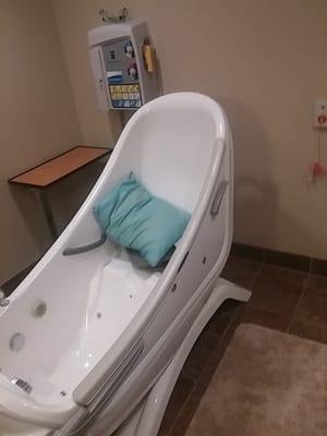 A whirlpool bathtub designed for a spa experience for those with limited or no mobility