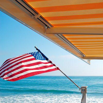 We have an entire online store of Flags and Flagpoles. Also Retractable Awnings!