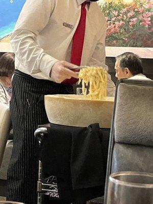 The server making the table side fettuccine