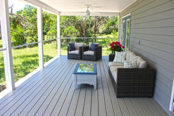 Spacious 2nd floor porch with comfy couches and chairs