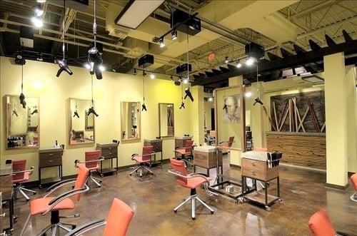 Hair cut area! So open with an industrial, yet warm feel.