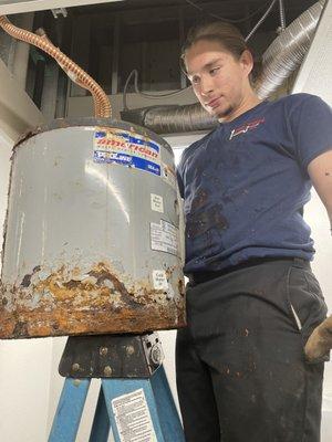 Daniel Garcia, Plumber's Apprentice at Heaton Plumbing in Houston Texas - Old Water Heater Removal