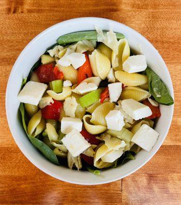 Pasta Bowl. Pasta & greens with your choice of toppings and dressing.