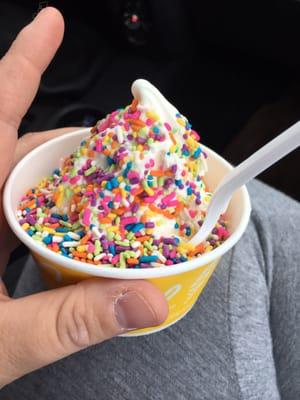 Vanilla ice cream with rainbow sprinkles