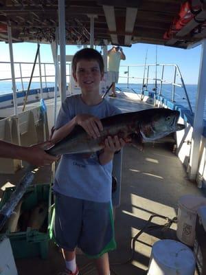 First bluefish catch for my son! He gives Cee Jay a thumbs up!