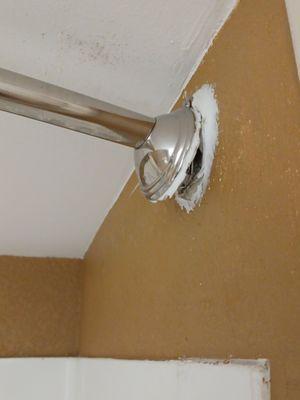 Shower curtain rod falling off bathroom wall.bathroom walls filthy