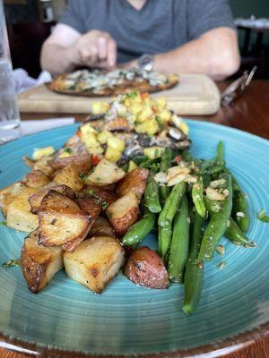 The Salmon dish with mango salsa, roasted potatoes and green beans.