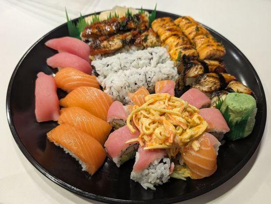 Small platter with salmon, tuna, wasbiko , California, and one other that I forgot the name to, and eel.