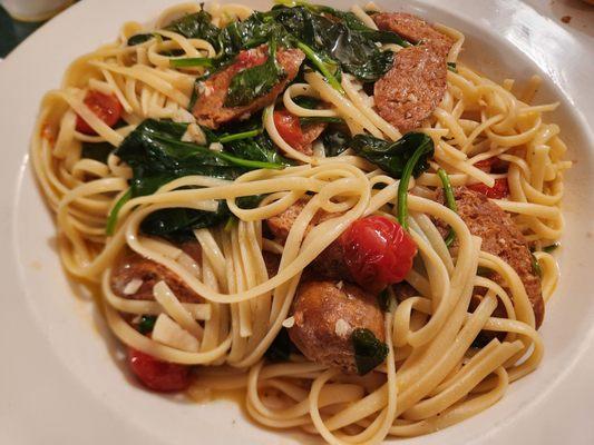 Spicy sauteed red cherry tomatoes,  spinach and spicy hot sausage. Very good dish with balanced subtle flavors