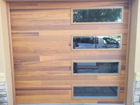 Overhead door garage door with glass going down the side