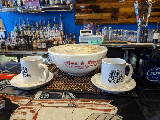 Great display! Tom and Jerry's batter and mugs ready to serve up!