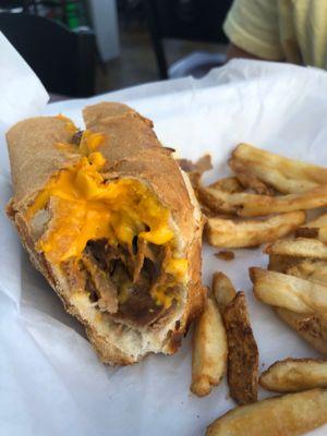 Philly Cheesesteak Wrap- Mach cheese sauce and no onions or pepper..$18