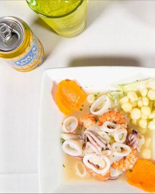 Ceviche Mixto. Fish, calamari and shrimp marinated in lime juice, peruvian pepper, garlic and salt.