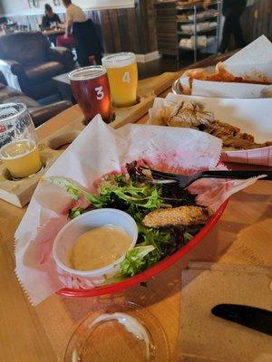 Our table of wings, fried green tomatoes,onion rings & a flight