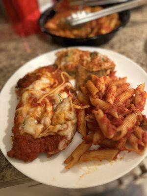 One of 2 chicken parm pieces, half the eggplant, and maybe 1/4 of the pasta on a plate. Great serving size!