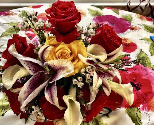 Roses, orchids, and calla lilies!! Each one special!