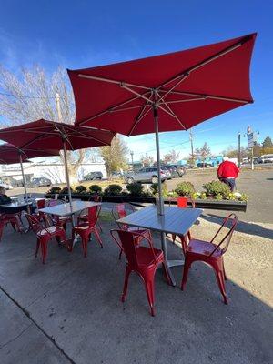 Sunny outdoor area with umbrellas for shadows seatings.