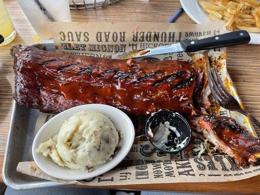 Full slab of ribs and mashed potatoes