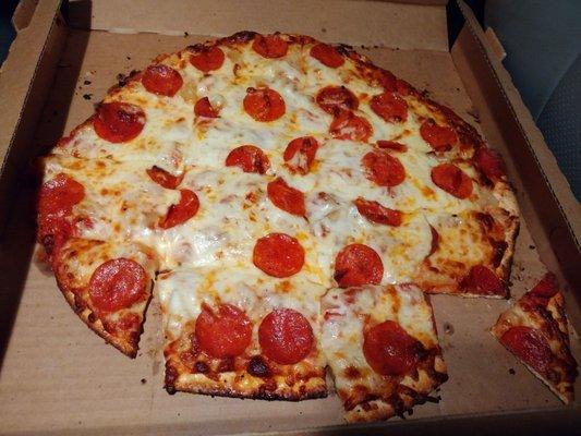 Pepperoni and pineapple pizza