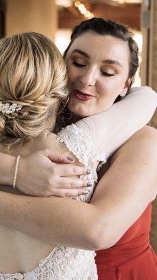 What a sweet picture of my friend hugging me but oops there's my dress looking torn