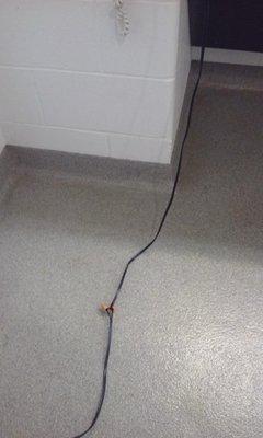 Someone had plugged in a fan in the men's locker room. The cord had been cut and was wire nutted back together.