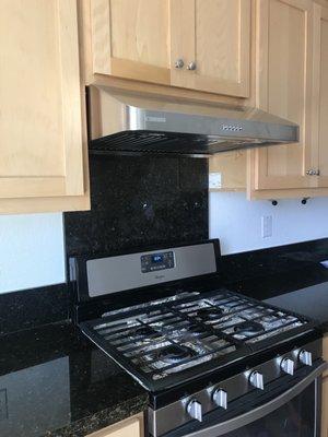 The under cabinet range hood that was installed by Ajay