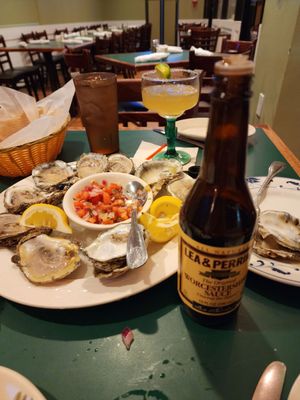 Beautifully shucked oysters. Topped each with Pico de Gallo and a squirt of lemon juice and of Worcestershire sauce.