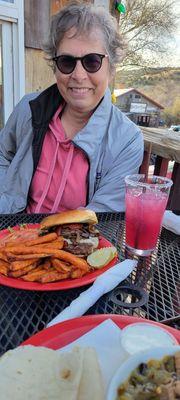 Prickly pear margarita and burger with sweet potato fries.