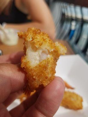 The batter is not cooked and the shrimp was super undercooked and slimy.