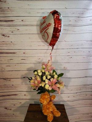 Just because bouquet with bear and balloon.