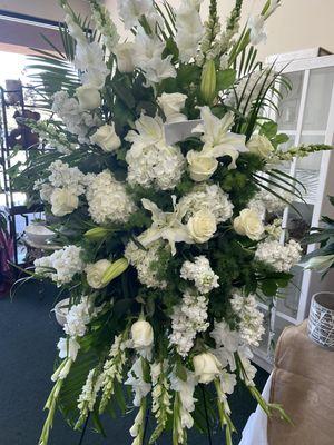 Sympathy arrangement for funeral home.
Standing spray with white flowers.