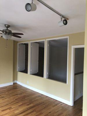 Painting of wall,  baseboards,frames and doors .