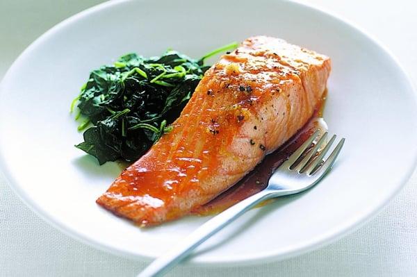 Grilled salmon with sautéed spinach