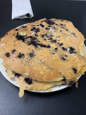 Blueberry pancakes size of the  plate