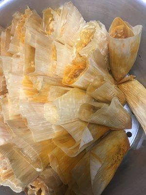 Home make tamales chicken and pork green and red