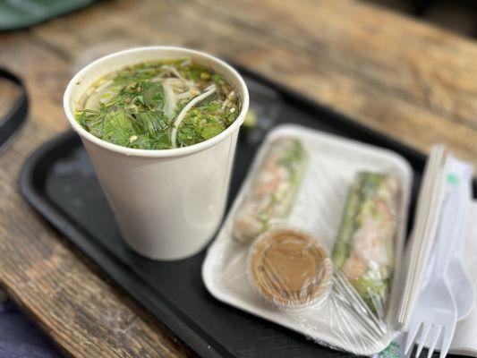 Beef pho cup and shrimp spring rolls with peanut sauce