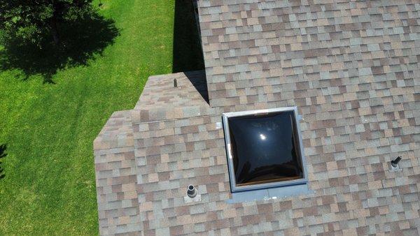 New Malarkey hail-resistant shingles and skylight installed after a hailstorm! Durable upgrades for peace of mind. Call 512-822-8387!