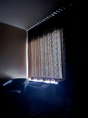 Curtain is short if light bothers you