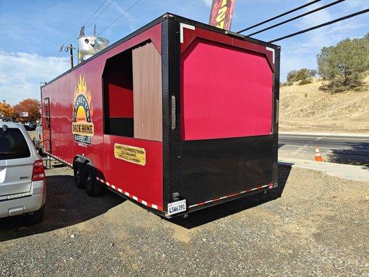 The backside of Garrett's food trailer.