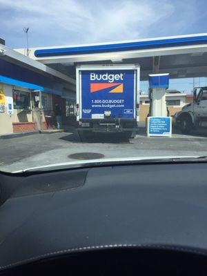 Trucks taking the gas station pumps as a parking spot.