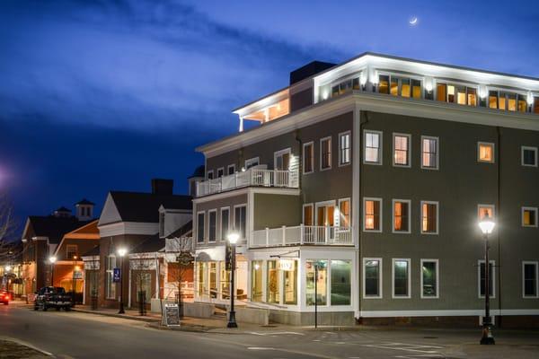 Exterior of 84 Main building at night