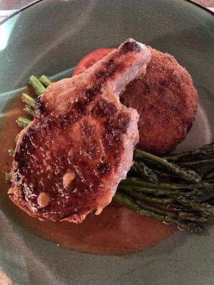 pork chop, fried potato salad, asparagus