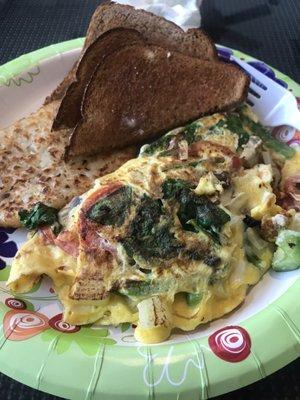 Make your own omelette with all the vegetables, hash brown and wheat toast.