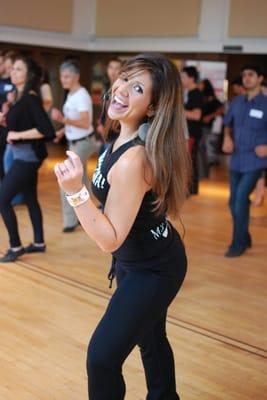 Leslie Ferreira teaches her students the latest Bachata Moves