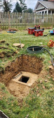 The Out-let side of the Septic Tank being Dug-up to Install a New baffle.