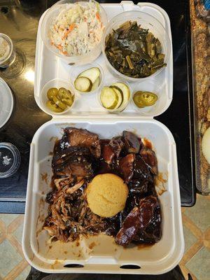 Coleslaw collard greens brisket sliced chicken pulled pork pork rib cuts cornbread jalapeño and pickles