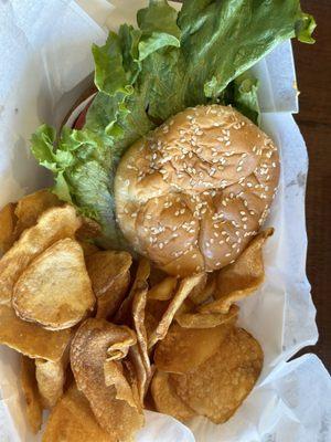 Cheeseburger and fried chips.